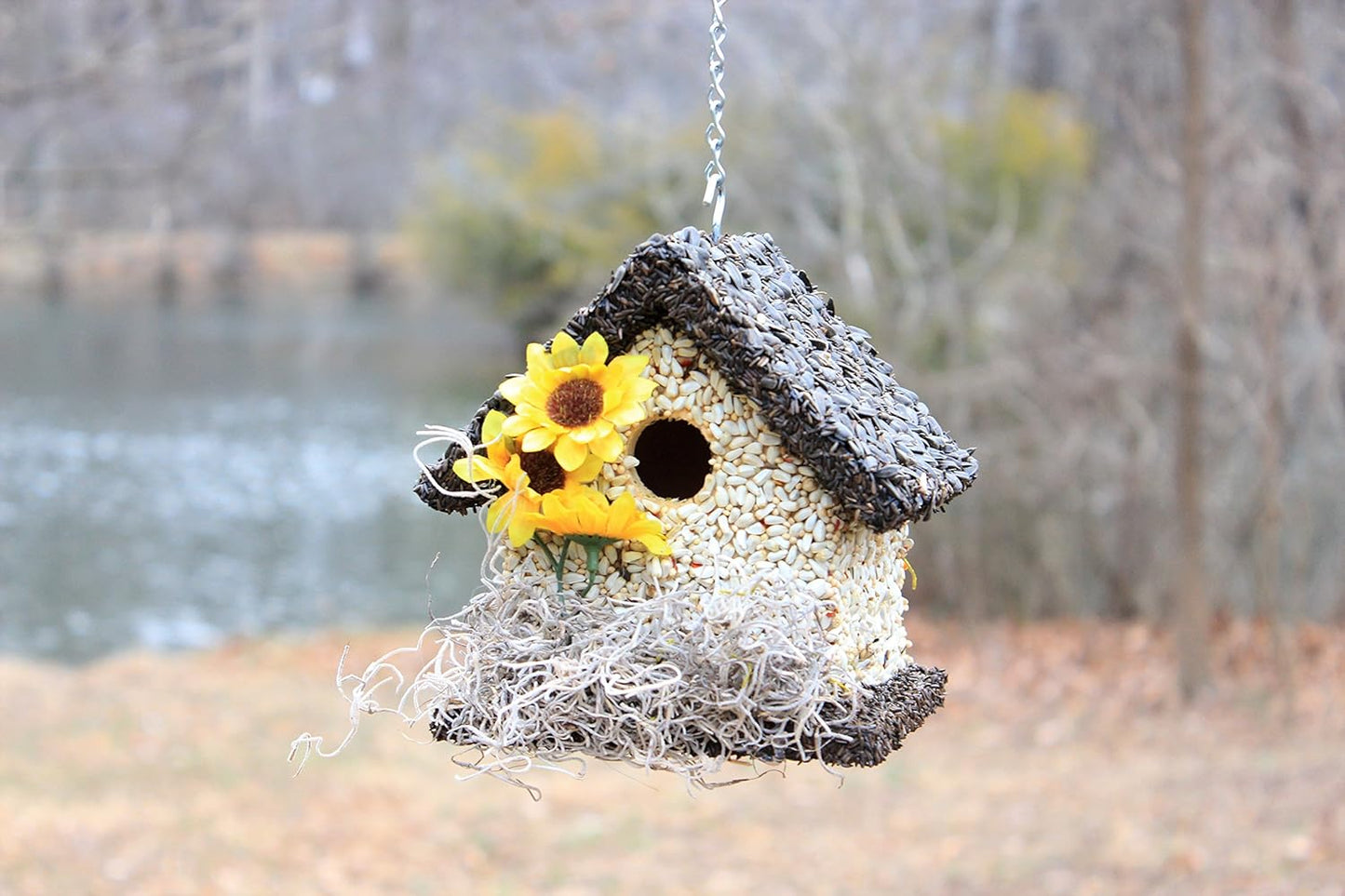 outdoor view of dark-roofed villa style birdhouse/bird feeder